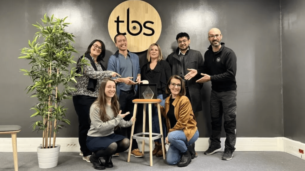 TBS Education team with the award