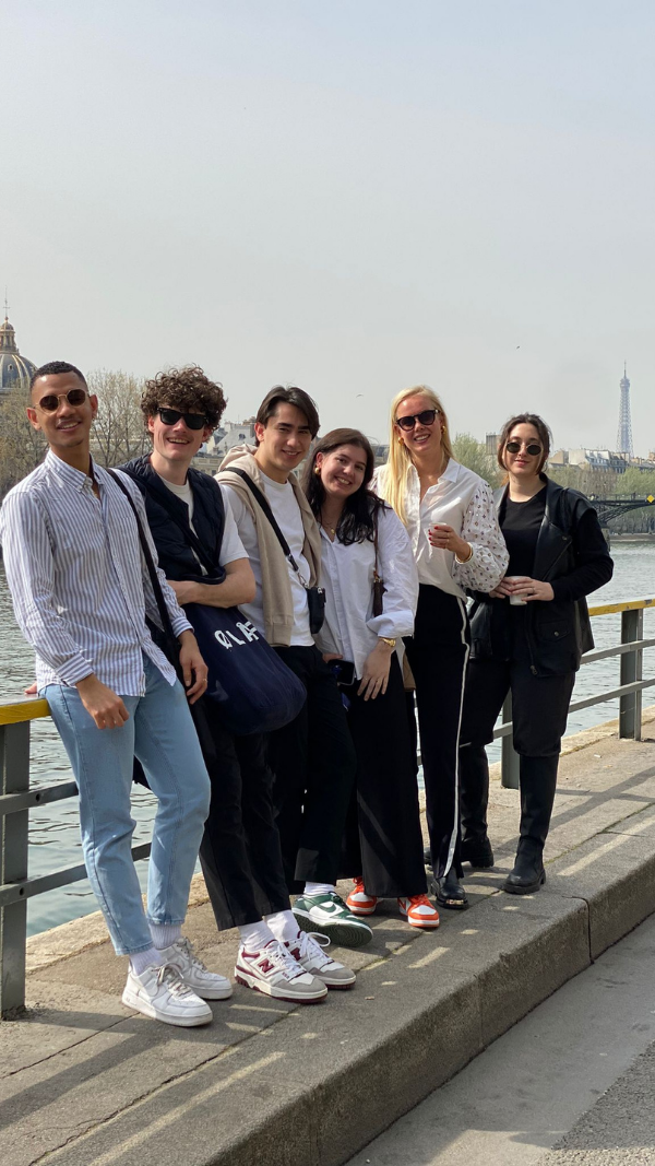 Six students from the MSc Fashion & Luxury Marketing program in Paris, participating in a collaborative learning experience.